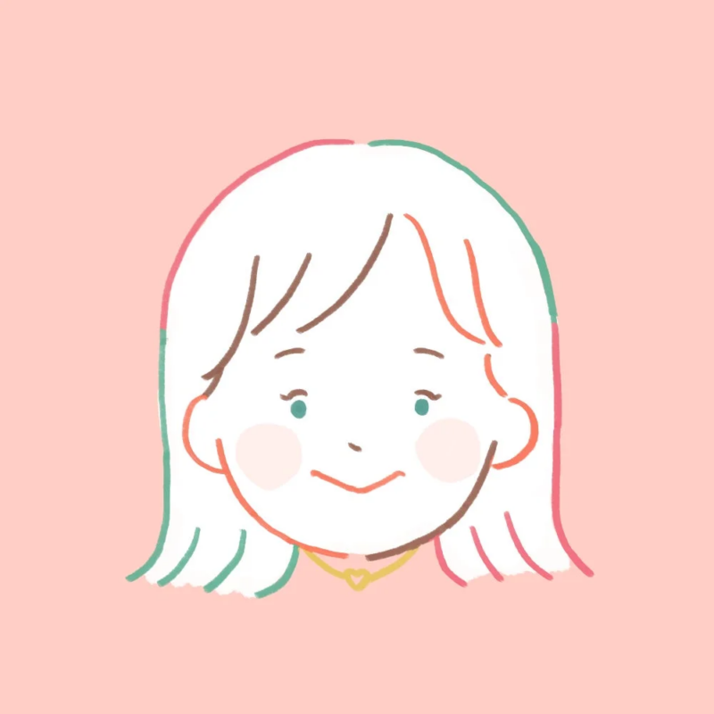 ピンクの背景に描かれた、シンプルで可愛らしい女性の顔のイラスト